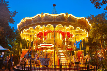Merry go round carousel childhood entertainment. Vintage playground attraction