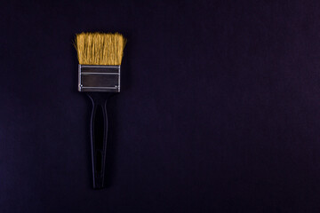 creative layout black paint brush on black background