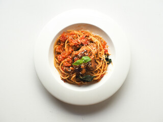 Top view dish of meatball spaghetti in tomato sauce