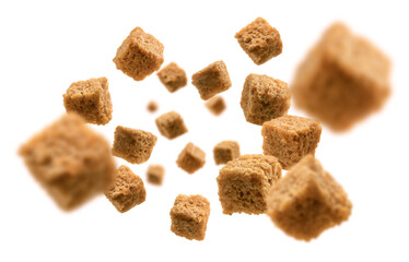 Bread croutons levitate on a white background