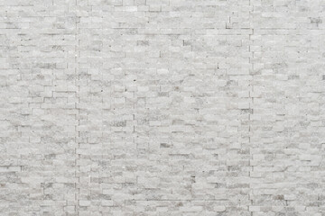 White modern decorative natural stone for inside. Panel wall small marble brick background texture, decorative pattern quartz stone mosaic. interior decoration of the room