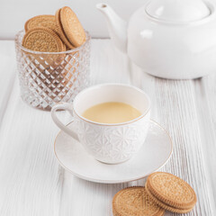 teapot and cup with hot alcoholic drink