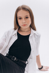Pretty beauty young girl model posing on white background in studio. Caucasian 