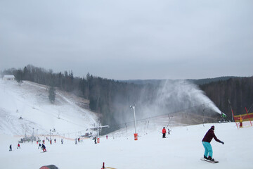 Winter. Sports winter season. Cesis. Latvia.  Europe. Picture of of ski hill. Just another day skiing in the mountain.