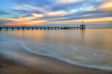 Fototapeta premium sunrise over the beach and the sea