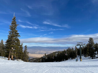 Landscape view of Carson valley as seen from the slopes at a ski resort in Tahoe on a sunny day in...