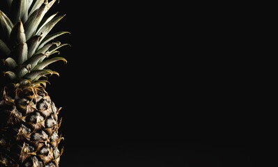 Pineapple isolated on black background © Exploder