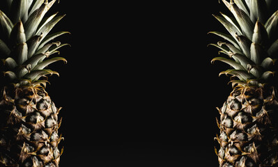 Pineapples isolated on black background © Exploder