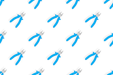 Pliers seamless pattern. Metal pliers with rubber grips.