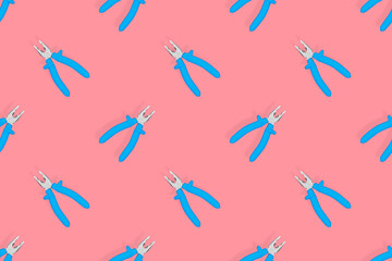Pliers seamless pattern. Metal pliers with rubber grips.