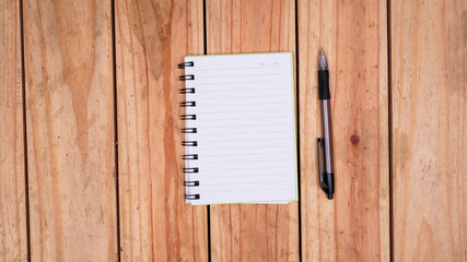 blank white paper notes with pen on top wood table