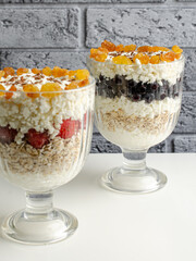 Healthy breakfasts oatmeal with berries and cottage cheese. Healthy diet. 