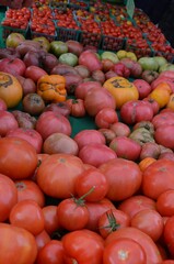 Multi-colored Heirloom Tomatoes for Sale at an Outdoor Market