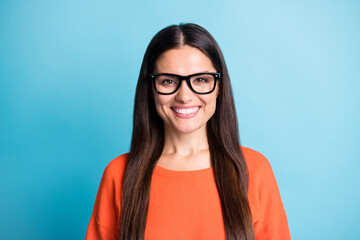 Photo of attractive person toothy beaming smile wear eyewear look camera isolated on blue color...