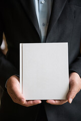 businessman holding a clipboard