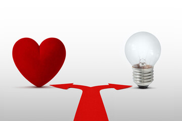 Two way arrows with heart and light bulb - Concept of choice between heart and mind