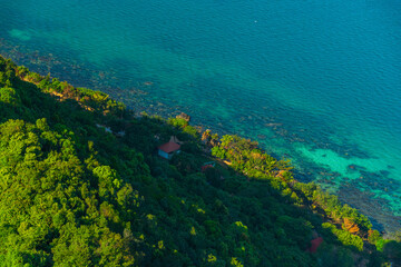 Aerial view of sea waves and fantastic rocky coast at Hon Thom island in Phu Quoc island, Kien Giang, Vietnam