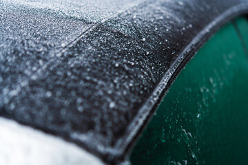 Fabric Convertible Car Roof Covered by Frost and Ice