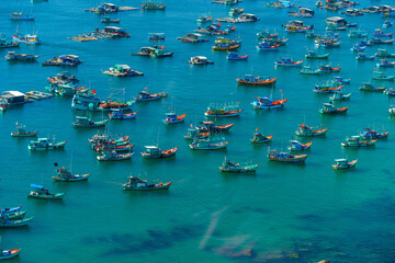 Fototapeta na wymiar Aerial view of traditional fishermen boats lined in An Thoi harbor of Duong Dong town in the popular Phu Quoc island, Vietnam, Asia.