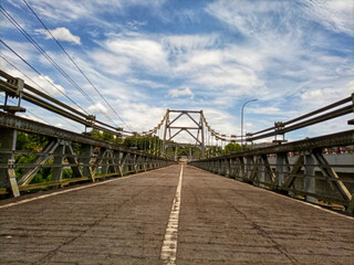 the charm of the kaliprogo bridge during the day