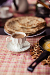 Delicious pancakes on a plate. Coffee with milk. Healthy, sweet, food. Rustic breakfast