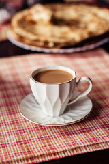 Delicious pancakes on a plate. Coffee with milk. Healthy, sweet, food. Rustic breakfast