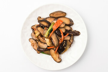 Stir-fried mushrooms on a white background