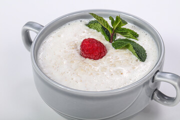 Sweet dietary oats porridge served berry