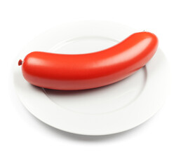 A swedish sausage 'falukorv' on a white plate. Studio portrait isolated on white background.