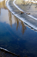 Winter wonderland landscape scenery at River Isar in dowtown Munich, great for walks in outdoor...