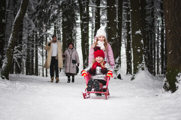 Fototapeta na wymiar Two little girls playing in the winter