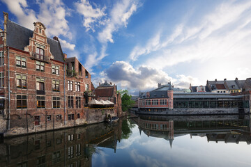 Embankment  along the Leie river with medieval houses in the city of Ghent, Belgium