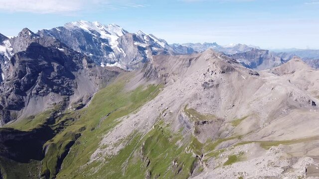 Snow-capped mountains of Swiss Alps skyline seen from Schilthorn summit panoramic platform. Murren, Canton of Bern, Switzerland. Oberland Bernese, Jungfrau Region above Murren in Lauterbrunnen.