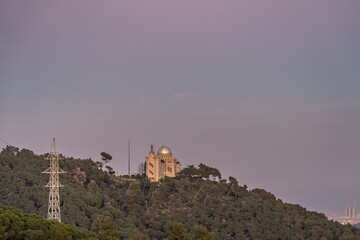 Fototapeta premium Mount Tibidabo top view of Barcelona city after sunset