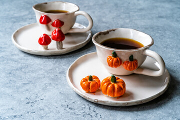 Handmade Ceramic Coffee or Tea Cups with Pumpkin and Mushroom Pattern Figure Design Handcrafted. Handicraft.