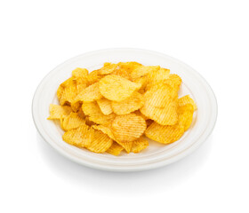 Plate of tasty ridged potato chips on white background