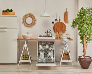 Decorative kitchen and dishwasher, refrigerator, sink and counter decorative style, lamp stone wall background.