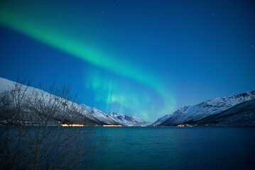 Stunning Aurora across Norwegian Fjord