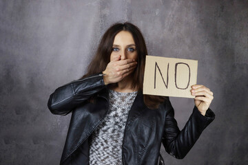 Naklejka premium No word on the poster showing young woman, denial and rejection concept
