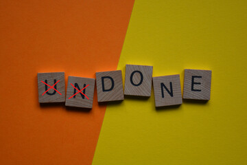 Undone with Un crossed out, leaving the word done