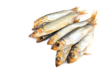 Delicious Baltic herring, hot smoked on a white isolated background, selective focus.Space for text .