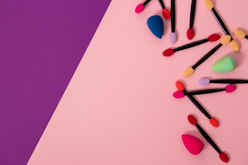 Professional makeup brush on colorful background