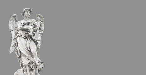 Fototapeta na wymiar Banner with beautiful holy angel with wings at the Saint Angel bridge isolated at smooth grey background and with copy space for text, Rome, Italy.