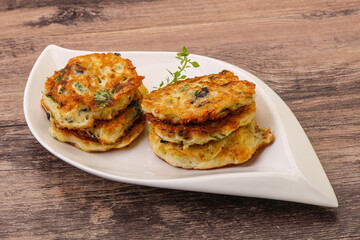 Zucchini pancakes with herbs and spices