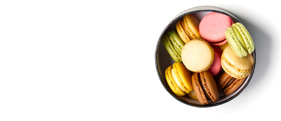 Colorful small macarons in the circle box like a gift