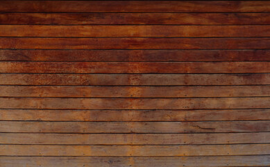 Obraz premium Natural Wooden background from old texture boards. Wooden rustic background. Copy space for your text or image. Top view. Dark brown wood boards. Blank for design and require a wood grain.
