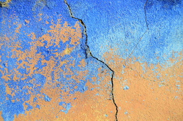 Textura de uma parede azul e laranja