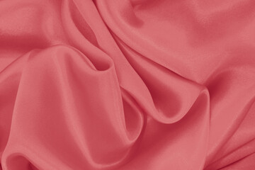 Rose gold fabric texture background, detail of silk or linen pattern.