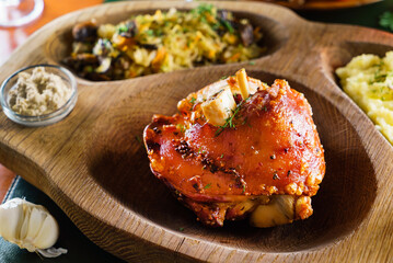 eisbein with braised cabbage, salad and beer