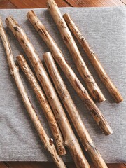 Macrame sticks are in a row.